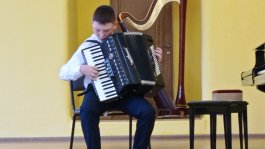 Школьный конкурс «Мои музыкальные каникулы».